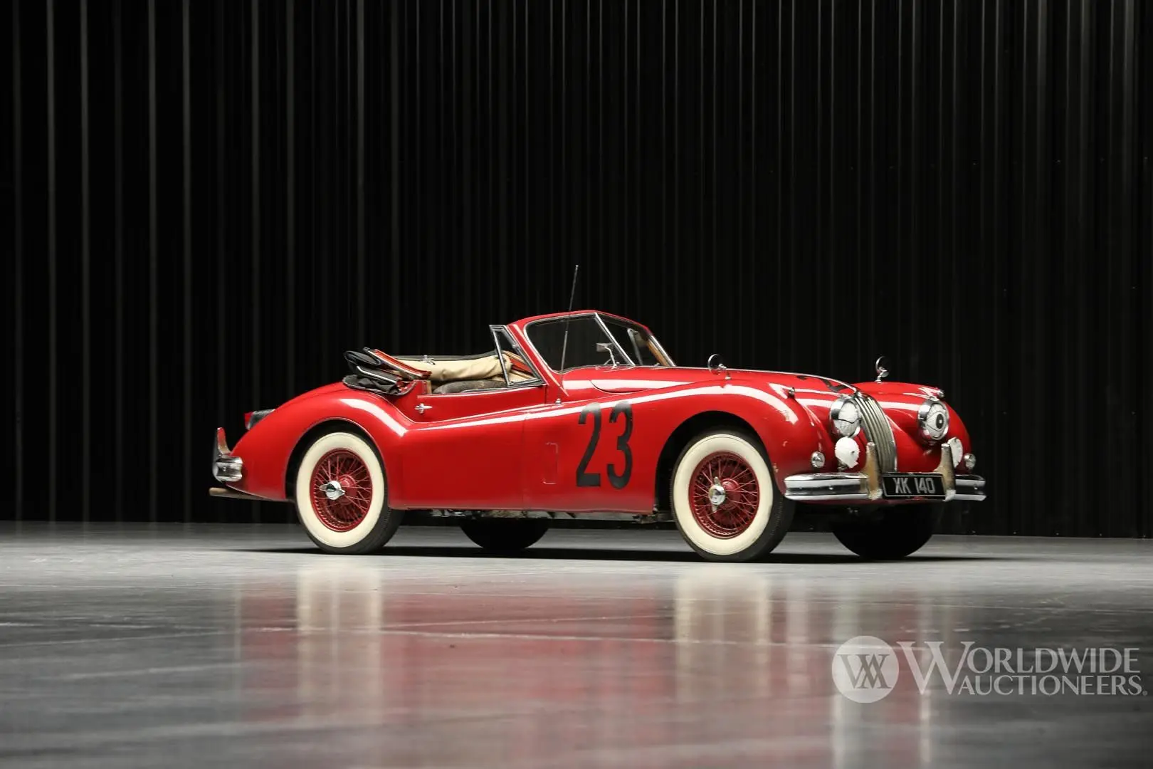 The ex-Briggs Cunningham 1956 Jaguar XK140 MC Drophead Coupe, chassis S818207, wearing Denise McCluggage’s number 23. Photography courtesy Worldwide Auctioneers.